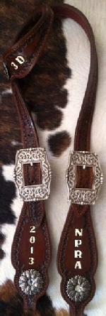 Hand tooled, dyed and painted award headstall.