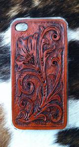 Hand tooled and dyed cell phone case.