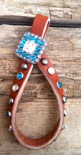 Bling tie down keeper.