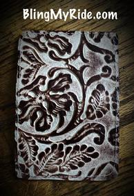 Floral embossed leather credit card/ID holder.