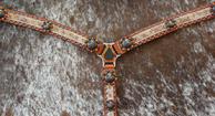 Belt style breast collar with light brindle hair-on, Fire opal Swarovskis and Ant. bronze hardware.