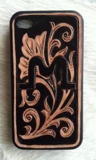 Custom hand tooled cell phone case.