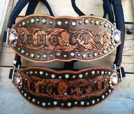 Hand tooled award halters.