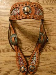 Bling Headstall. Turq. Floral embossed browband headstall w/ Bronze fancy dots, bronze hardware, and Aqua and Burgundy Swarovskis.