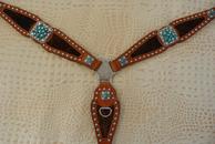 BlingTurquoise Chunk breastcollar. Chestnut oil Herman Oak leather, Dark Brindle hair-on inlays, Silver spots, Turquoise chunks and clear crystal Swarovskis