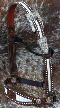 Inlay, buckstitched, belt style halter w/ Cowperson hardware. Colors can be changed at no extra charge!