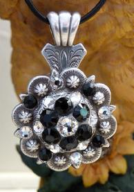 Bling Concho necklace. Antique Silver Berry concho w/ Jet and Clear Crystal Swarovskis on an 18" black cord necklace.