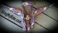 Hand tooled and painted feather and scroll set. Finished off with Crystal Swarovski bling!