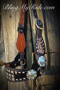 Hand tooled custom leather steer show halter with personalized ranch name, or brand on noseband. Black leather and white buckstitch.