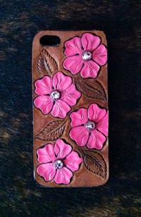 Hand tooled and painted cell phone cover w/ Swarovski crystals.