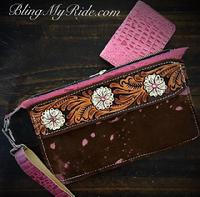 Western Style Pink acid wash hair on hide wristlet. Comes with matching CC/I.D. holder. Hand tooled and painted accent. Fully lined. Zipper closure.