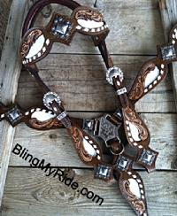 Hand tooled and buckstitched tack set with browband headstall. White buckstitch, bone or white croc.