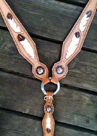 Hand tooled feather breast collar.