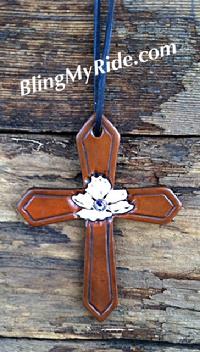 Hand tooled floral saddle cross.