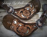 Hand tooled spur straps.