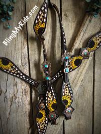 Hand tooled sunflower tack set with cheetah inlays.