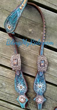 Antiques turquoise hand tooled daisies headstall with copper spots/hardware.