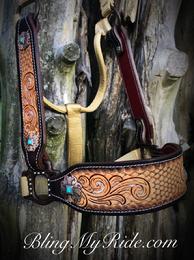 Hand tooled bronc style halter. Scroll and a geometric pattern. Classy with a touch of turquoise.