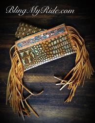 Western style embossed croc. clutch . Fully lined, deer tan fringe, hand tooled and painted leather accents. Completely hand made.