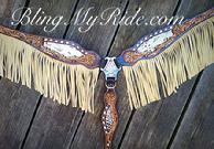 Hand tooled breastcollar with fringe and Swarovski crystals.