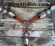 Hand tooled, painted and inlaid feather breastcollar.