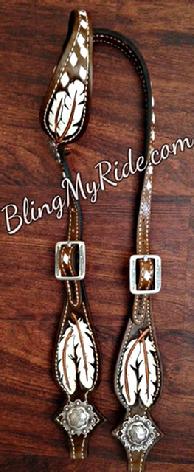 Buckstitched and hand tooled feather headstall.