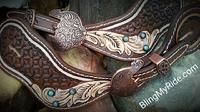 Hand tooled spur straps with turquoise cabachons.