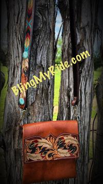 Hand tooled, hand made, hand painted cross body western style purse with hand tooled and beaded purse strap.